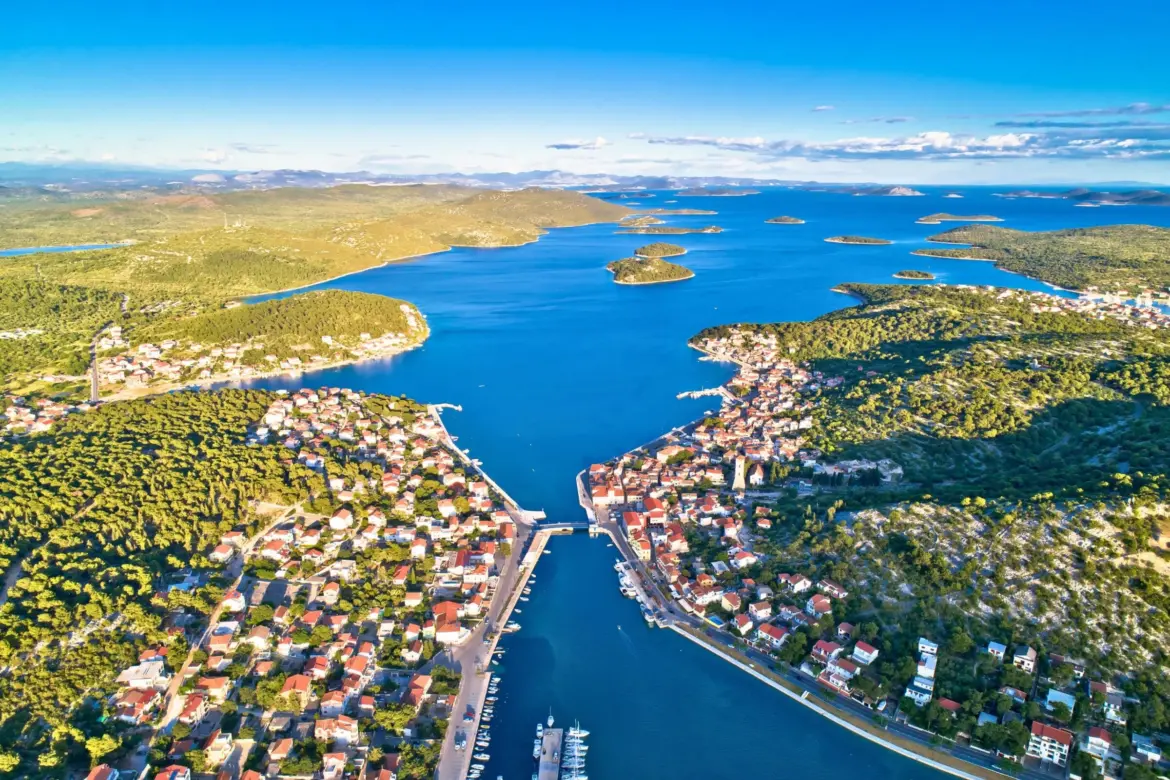 Which Croatian island is the closest to the mainland? It is connected to the mainland by a bridge only 12 meters long, which is raised twice a day.